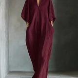Long dress with 3/4 sleeves and V-neckline