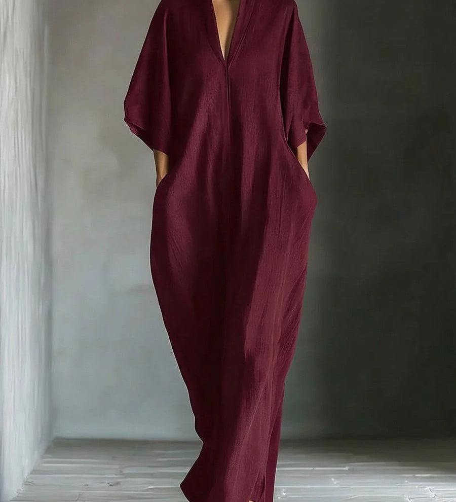 Long dress with 3/4 sleeves and V-neckline