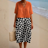 Penelope Dress - Orange with contrast dots