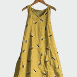 A dress with a bee pattern