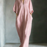 Long dress with 3/4 sleeves and V-neckline