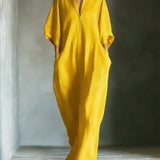 Long dress with 3/4 sleeves and V-neckline