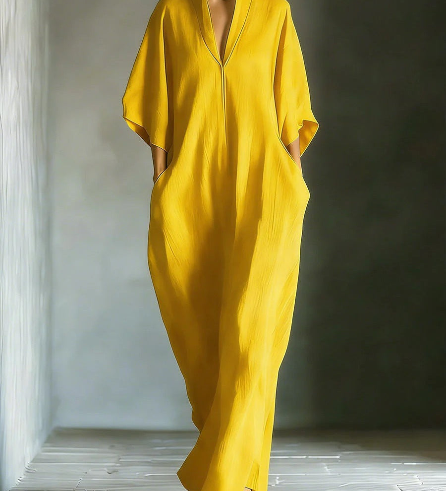 Long dress with 3/4 sleeves and V-neckline