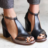 Black high-heeled sandals with open toes in patchwork style
