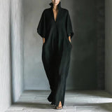 Long dress with 3/4 sleeves and V-neckline