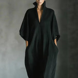 Long dress with 3/4 sleeves and V-neckline