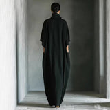 Long dress with 3/4 sleeves and V-neckline