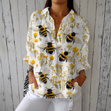 Light blouse with a bee pattern