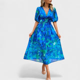Elegantna Midi Haljina s Cvjetnim Uzorkom Clara