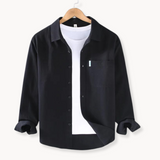 Shirt with flexible buttons