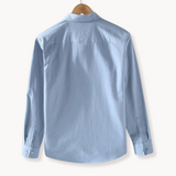 Shirt with flexible buttons