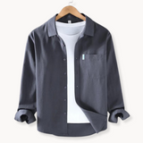Shirt with flexible buttons