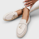 Women's beige moccasins with laces